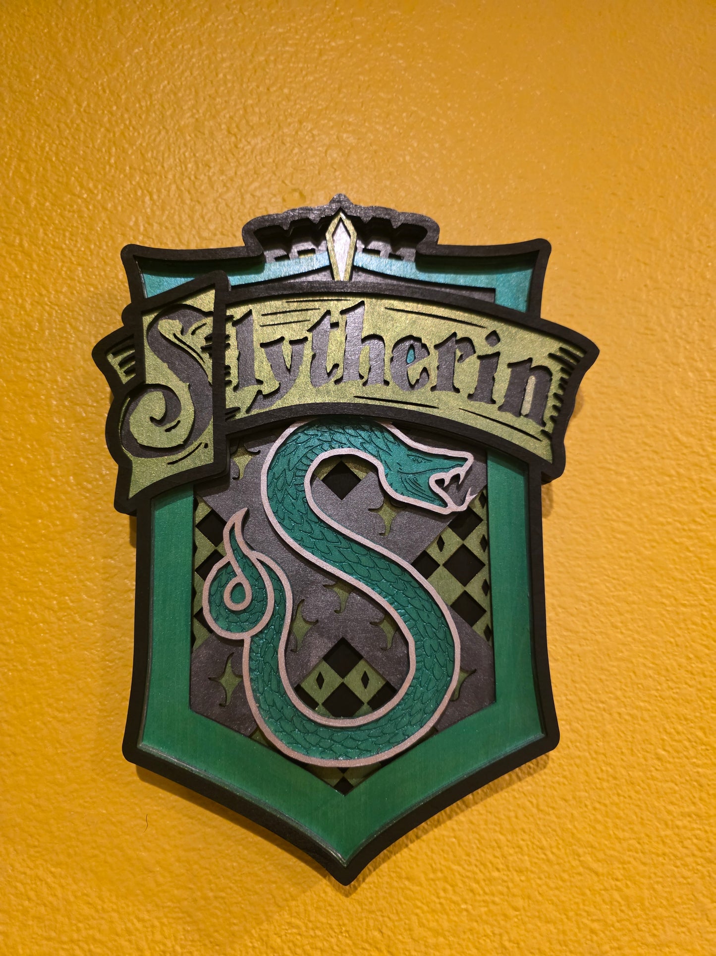 Magic House crest