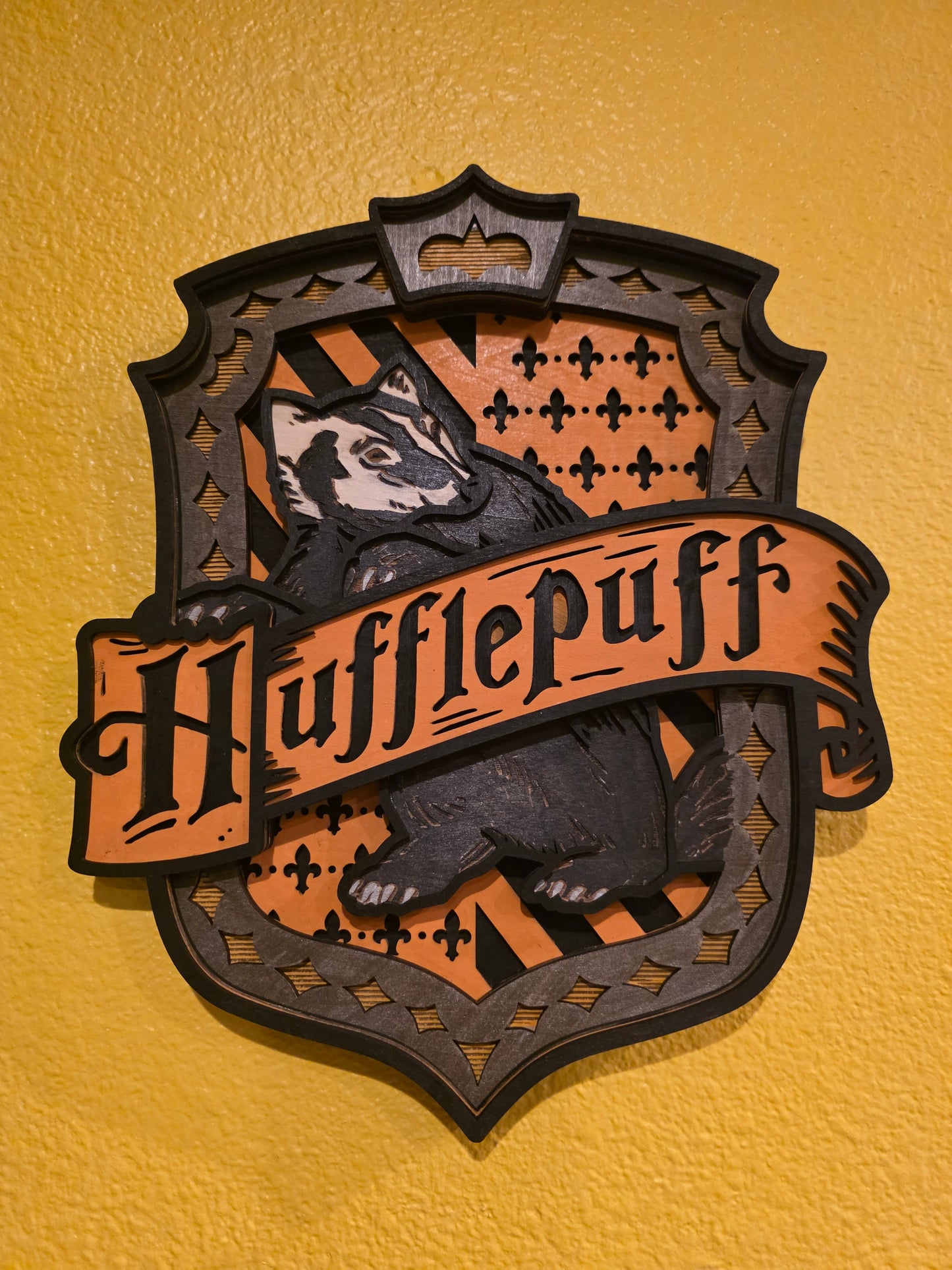 Magic House crest